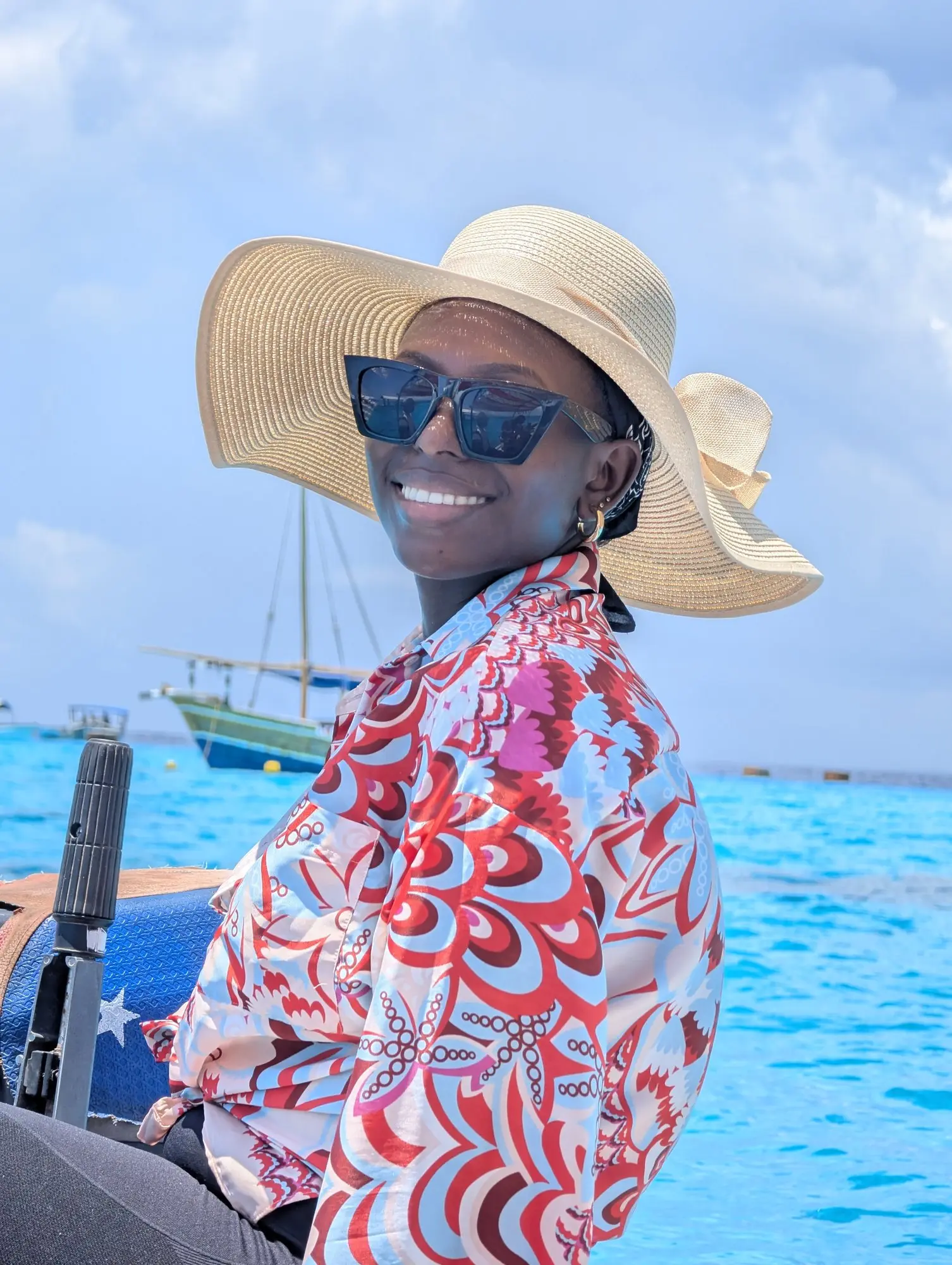 On the water, hat secured, no regrets.