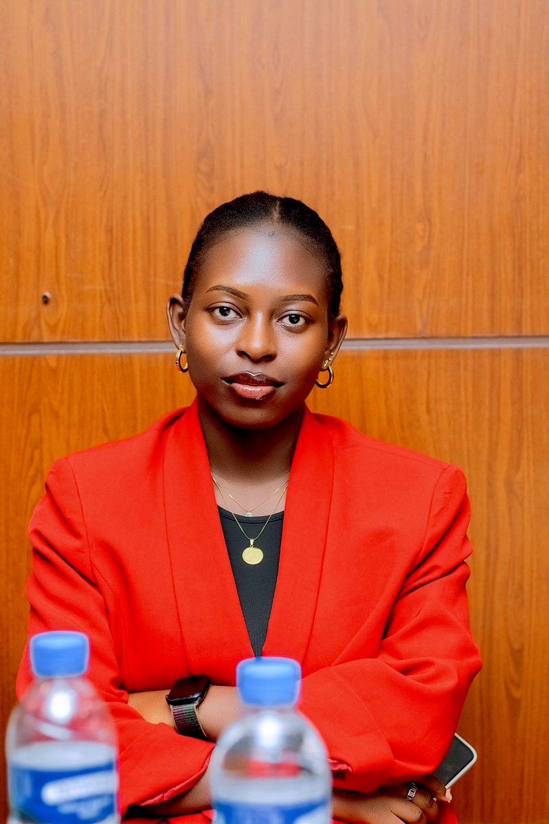 Doria Igiraneza in a red blazer